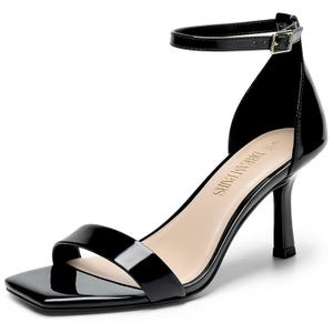 A black patent leather high heel sandal with an ankle strap and buckle, featuring a square toe design.