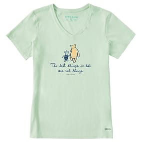 Pale green V-neck T-shirt featuring a graphic of two characters walking together and the phrase \“The best things in life are not things.\“ Marked with \“LIFE IS GOOD\“ branding.