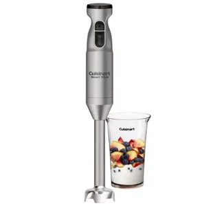 Cuisinart Smart Stick immersion blender alongside a measuring cup filled with yogurt, peaches, and blueberries.