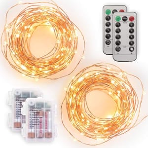 Fairy string lights with warm white LEDs, two battery boxes, and two remote controls featuring options for different lighting modes and brightness settings.