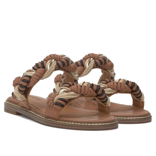 Brown sandals with braided rope straps in shades of tan, cream, and black, featuring a flat sole with visible stitching.