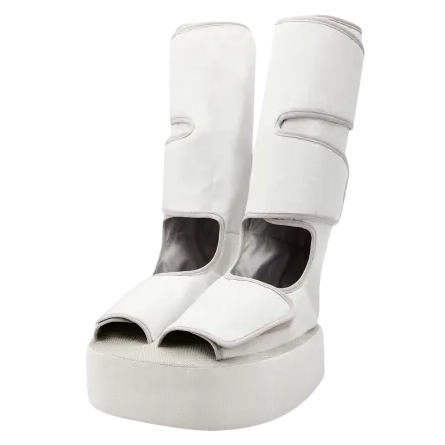 White, knee-high platform shoes with a futuristic design, featuring open toes and large Velcro straps.