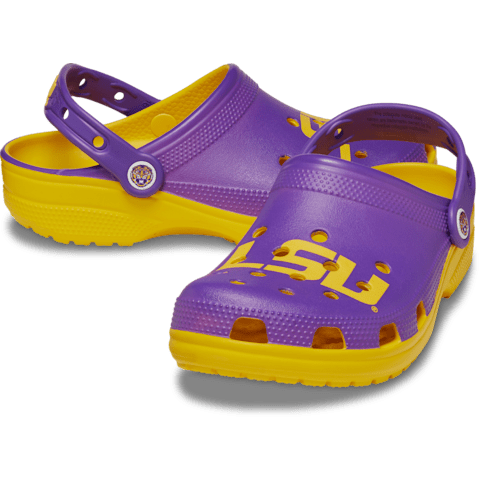 Purple and yellow clogs featuring the letters \“LSU\“ on the front, with adjustable back straps and side ventilation holes.