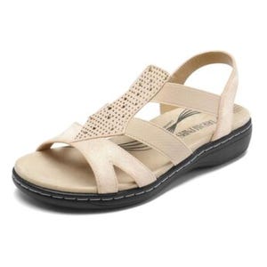 Beige sandal with slingback strap, perforated design on the upper, and cushioned footbed. Features a low, black sole with visible stitching for added support and comfort.
