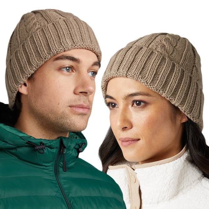 A beige cable knit beanie by 32 Degrees, featuring a ribbed design for a snug fit. Suitable for both men and women, it provides warmth and style, as illustrated by the models wearing green and white jackets.