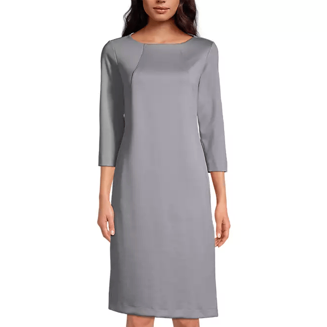 A gray, knee-length dress with three-quarter sleeves and a boat neckline, designed in a simple and elegant style.