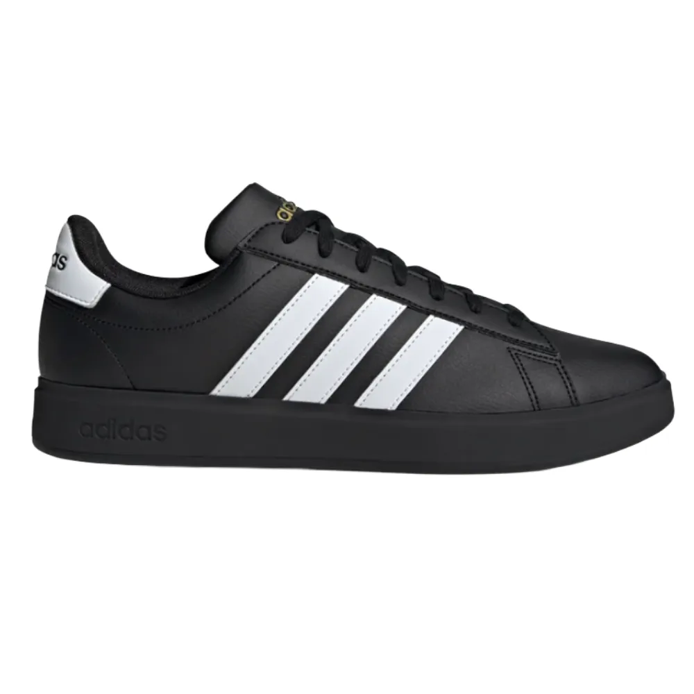 Black Adidas sneaker with three white stripes on the side, featuring a black sole and laces.
