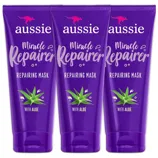 Three tubes of Aussie Miracle Repairer Repairing Mask with Aloe, packaged in a purple design featuring an aloe plant graphic.