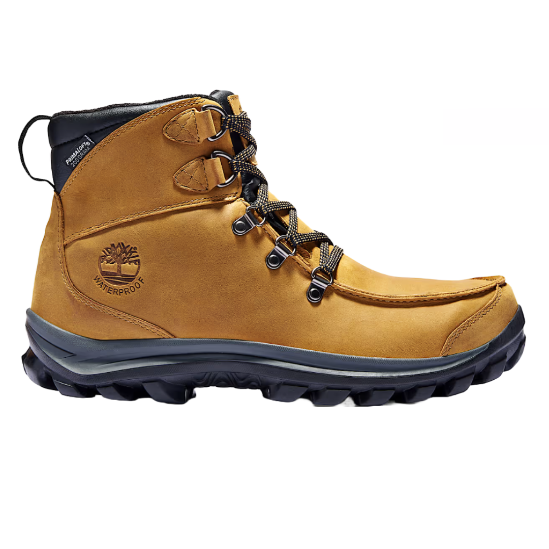 Timberland Chillberg Boots in tan feature a mid-top design, waterproof leather, and durable rubber soles. They include secure lace-up closures and display the Timberland logo on the side.