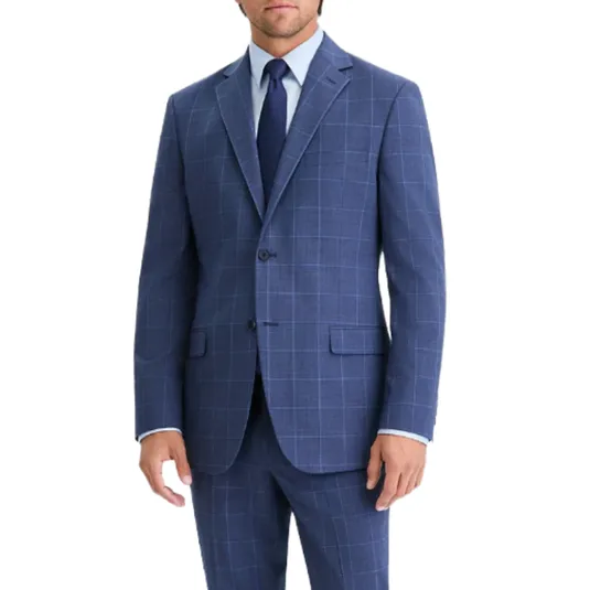 A man is wearing a blue checkered suit with a matching tie and a light blue dress shirt. The suit features a two-button closure and flap pockets.