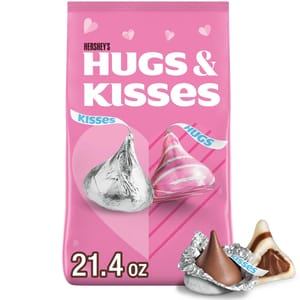 Hershey's Hugs & Kisses bag, featuring silver-wrapped Kisses and pink-striped Hugs chocolates. The package size is 21.4 oz.