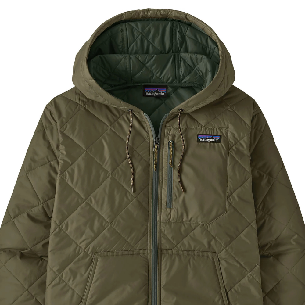 A khaki-colored quilted jacket with a hood, featuring a front zipper, chest pocket, and a small embroidered logo on the left chest.