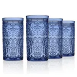 Four tall, blue drinking glasses feature an ornate, embossed pattern.