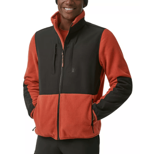 A man wearing a two-tone fleece jacket with a full zipper and side pockets.