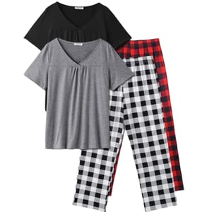 Two sets of women's pajamas with short-sleeve V-neck tops, one in black and one in gray, paired with two pairs of plaid pants, one in black and white checks and the other in red and black checks.