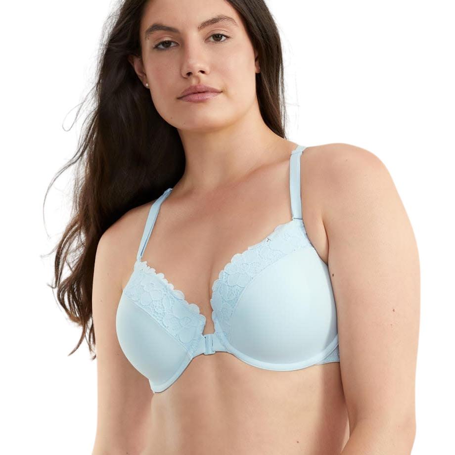 A woman is wearing a light blue lace bra and matching lace panties.