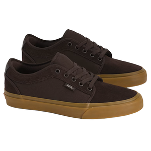 Brown Vans sneakers with a low-top design, featuring gum soles and matching brown laces.
