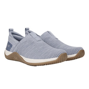 Ryka Echo Knit Slip-On Sneakers feature a light blue knit upper with a slip-on design, cushioned midsole, and tan rubber sole for traction. They have a streamlined look and a pull-tab for easy wear.