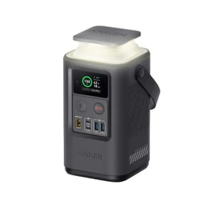 Anker 60,000mAh Power Bank is a compact device with a digital display showing charge status, multiple USB ports, and a handle for portability. It features an integrated lamp on top and includes buttons for power and SOS functions.