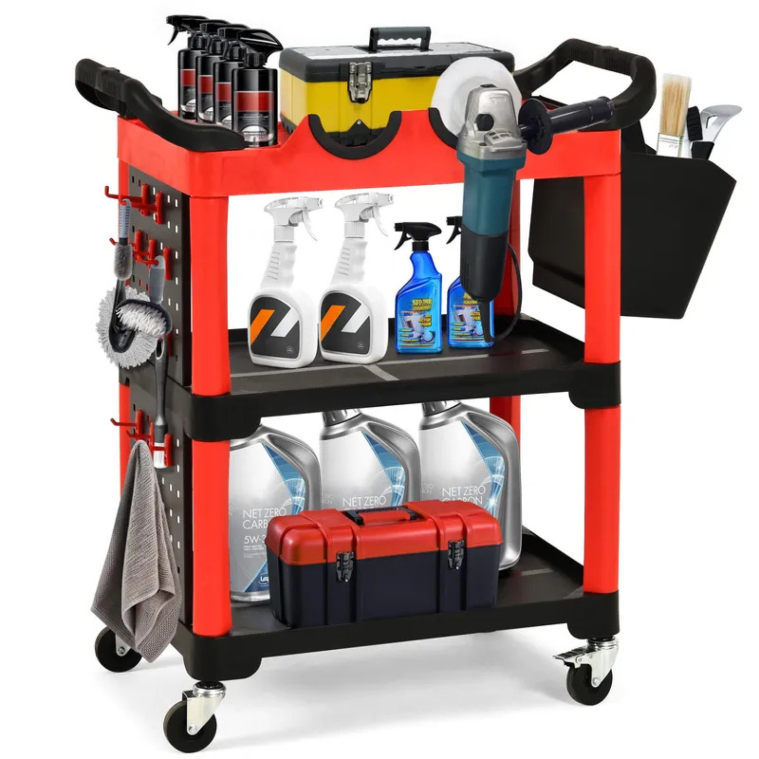 A red and black 3-tier detailing tool cart holds various items including cleaning sprays, a yellow toolbox, an angle grinder, a black organizer with brushes, several spray bottles, large canisters labeled \“Net Zero,\“ a red and black toolbox, and side hooks with cloths.