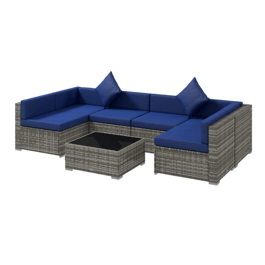Outdoor sectional sofa set with gray wicker frame, blue cushions, and a matching square coffee table with a glass top.