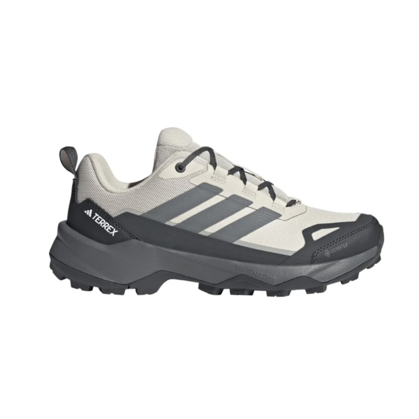 Adidas Terrex hiking shoe featuring a light gray upper, gray accents, and a rugged black sole designed for outdoor use.