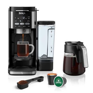 Ninja DualBrew Coffee Maker with a coffee pod and ground coffee option, includes a water reservoir, a carafe, and a scoop.
