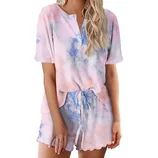 A short-sleeved, button-down tie-dye lounge set featuring a top with a round neckline and matching shorts with a drawstring waist. The set displays a soft blend of pastel colors, including pink and blue.