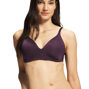 A woman is wearing a dark purple bra with thin straps and a V-neck design.