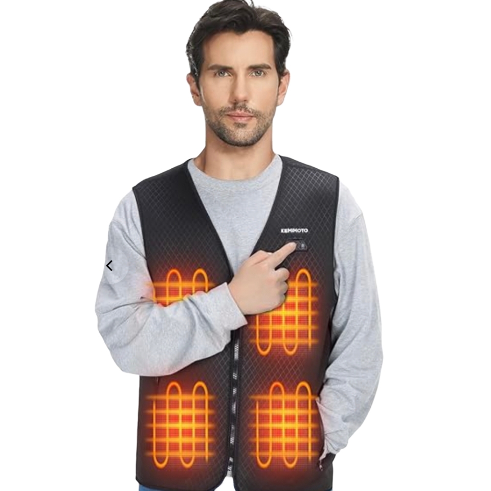 A man wears a heated vest with visible orange heating elements and a \“KEMIMOTO\“ logo.