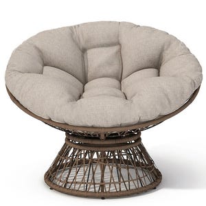 A round, cushioned Papasan chair with a swivel base, featuring a beige fabric cushion and a woven brown rattan frame. Suitable for both indoor and outdoor use.