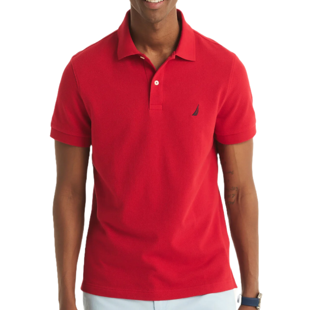 A red Nautica polo shirt featuring short sleeves, a classic collar with button closure, and the Nautica logo on the chest.