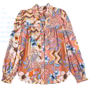 Colorful floral button-up shirt with a mixed pattern of leaves, flowers, and chevron stripes in shades of blue, orange, and white. Features long sleeves with gathered cuffs and a ruffled collar detail.
