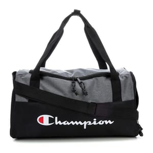 Champion duffel bag with a gray top and black bottom features black straps and two black zippers. The brand logo is prominently displayed on the side in white with a red accent.