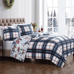 A 3-piece comforter set with a plaid pattern in navy, white, and red. The set includes two matching pillow shams and features a reversible side with a winter holiday scene, adding a festive touch to bedroom decor.