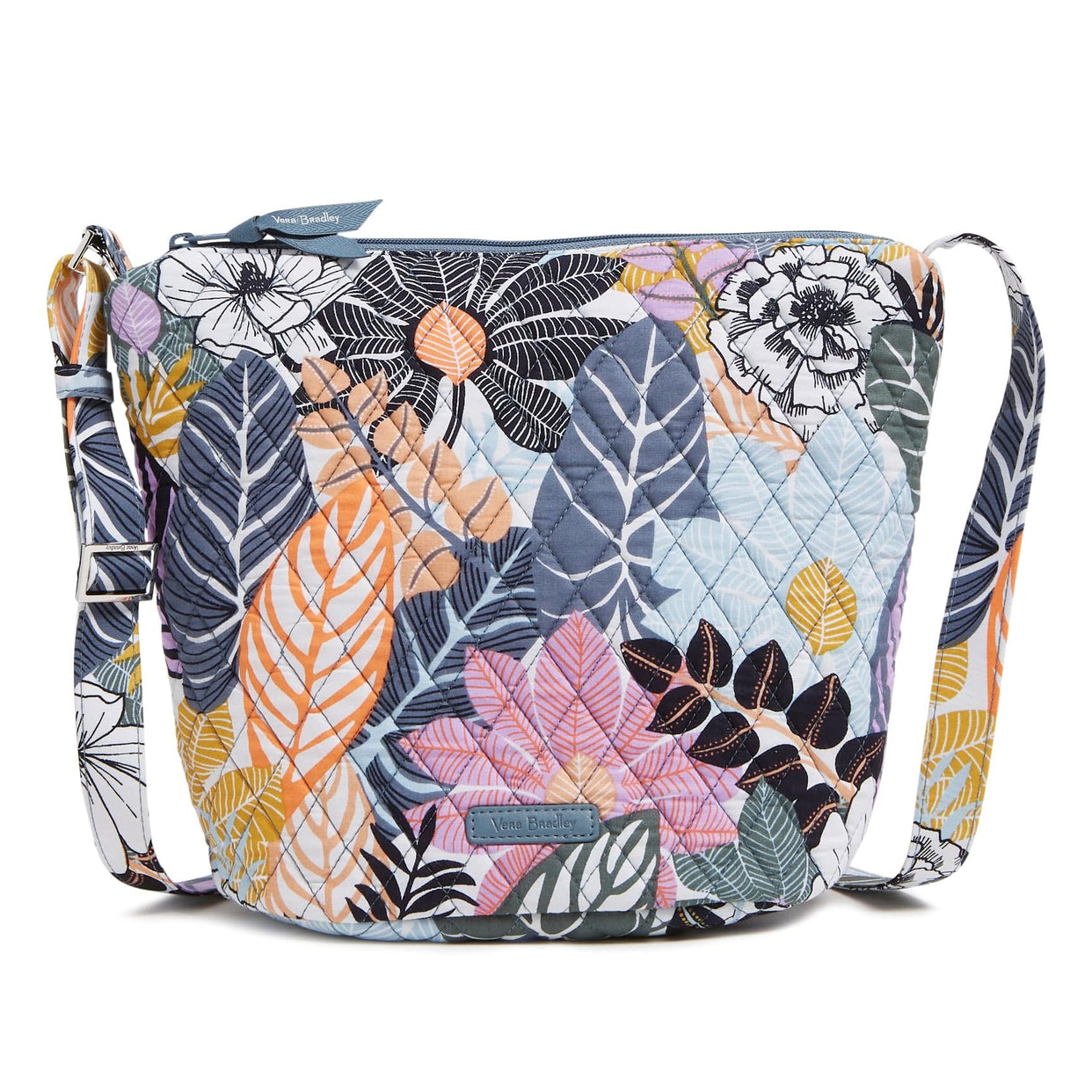 A floral patterned crossbody bag with an adjustable strap and a visible brand label.