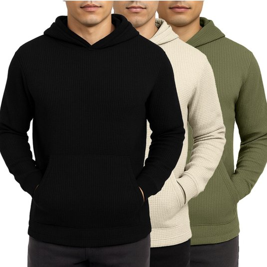 Three ribbed knit hooded sweatshirts in black, beige, and olive green, each with a front kangaroo pocket and long sleeves.