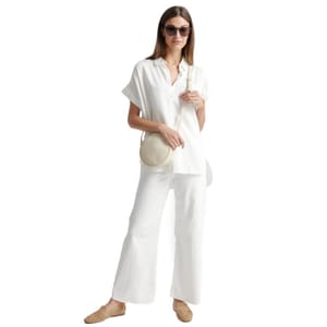 Quince Vintage-Wash Camp Shirts feature a relaxed fit with short sleeves and a button-up front, made from lightweight, soft fabric in a classic style.