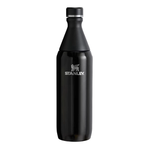 A black Stanley water bottle with a silver logo, featuring a tapered neck and removable cap.