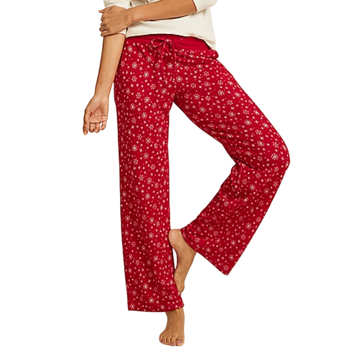 Red pajama pants with a white snowflake pattern and a drawstring waist.