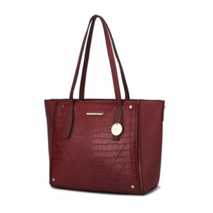 Red leather tote bag with a textured crocodile pattern and long handles, featuring a gold pendant and small metal accents.