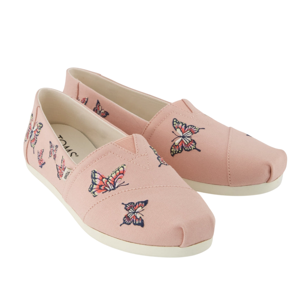 Pink slip-on shoes with multicolored butterfly embroidery.