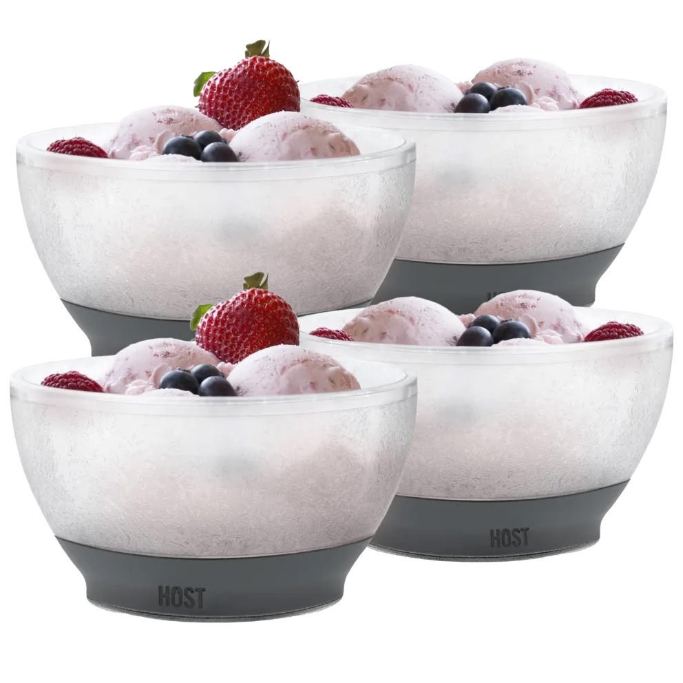 4pk Ice Cream Freeze Bowls with a frosted appearance, featuring gray silicone bases that keep desserts cold. Each bowl is filled with ice cream and topped with berries, including strawberries and blueberries.