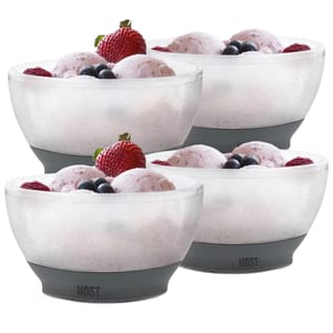 4pk Ice Cream Freeze Bowls with a frosted appearance, featuring gray silicone bases that keep desserts cold. Each bowl is filled with ice cream and topped with berries, including strawberries and blueberries.