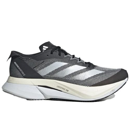 A black and white running shoe with a mesh upper, distinct white stripes, and a thick, cushioned sole designed for maximum comfort and performance.