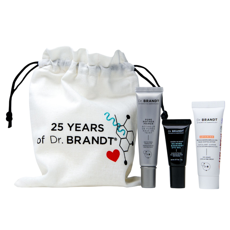 Dr. Brandt's 25th Anniversary skincare set includes Pore Refiner Primer, No More Baggage Eye Gel, and Advanced Microdermabrasion Exfoliator, presented in a white drawstring bag.