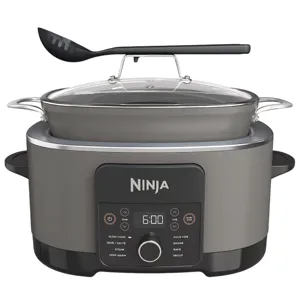 Ninja cooking appliance featuring a digital display and functions including slow cook, sear/sauté, steam, keep warm, sous vide, braise, bake, and proof, with a glass lid and serving ladle.