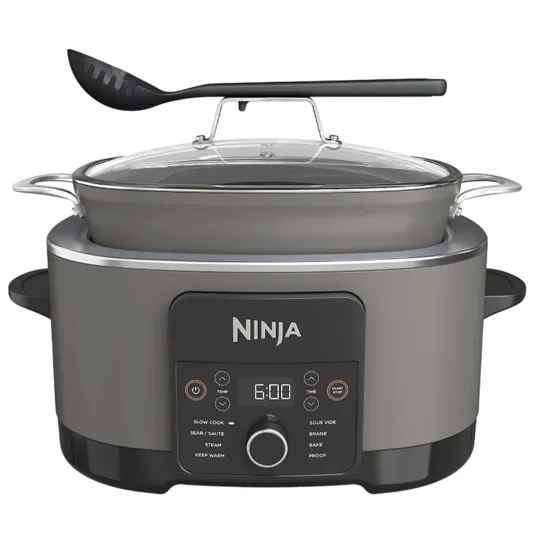 Ninja cooking appliance featuring a digital display and functions including slow cook, sear/sauté, steam, keep warm, sous vide, braise, bake, and proof, with a glass lid and serving ladle.
