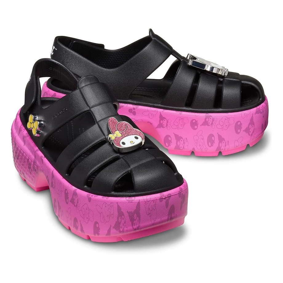 Black Crocs x Sanrio My Melody sandals with pink platform soles featuring various Sanrio character patterns; adorned with My Melody and Hello Kitty charms on the straps.