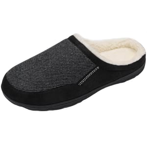 A pair of men's slippers with a black and gray upper, white fleece lining, and a black sole for indoor use.